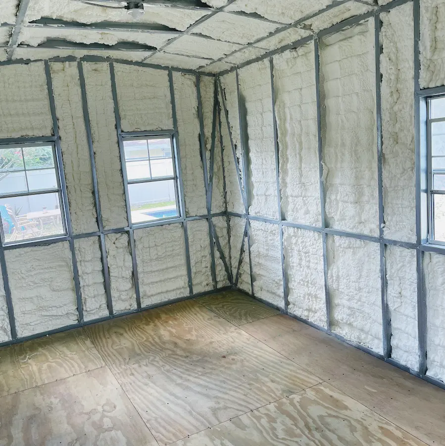 Closed-cell spray foam insulation applied to wall cavities in a residential project in Lake in the Hills